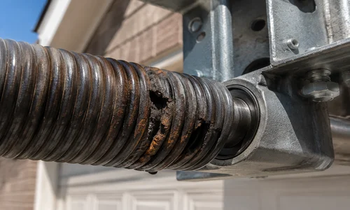 garage door spring heat damage jackson ms